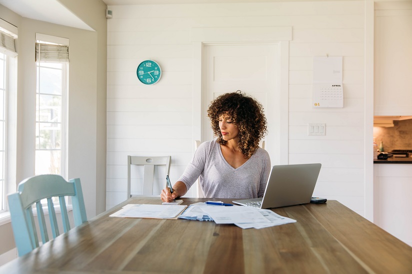 Woman Doing Finances at Home