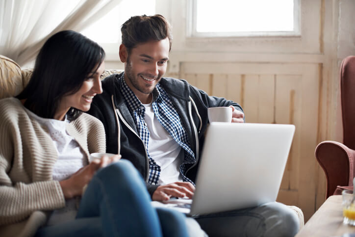 Couple looking at laptop