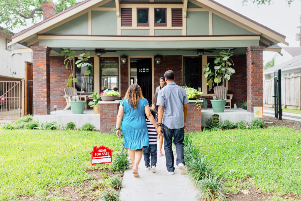 International real estate buyers viewing a potential investment property